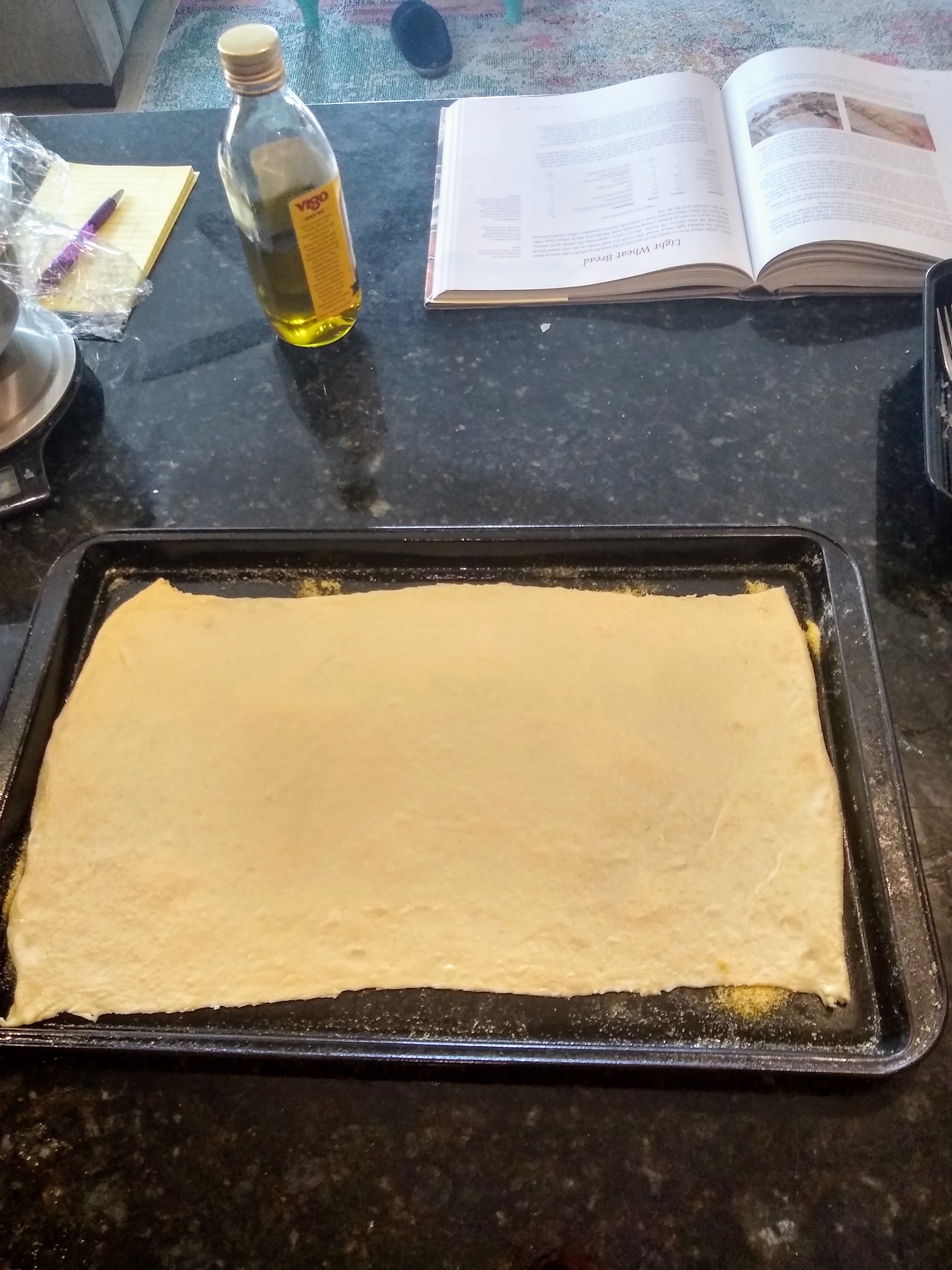 Lavash cracker dough on a baking tray
