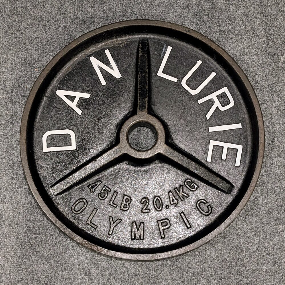 Dan Lurie Olympic 45 lb plate with large white block lettering