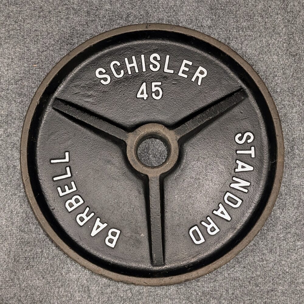 Black Schisler Standard 45 lb plate with raised white block lettering